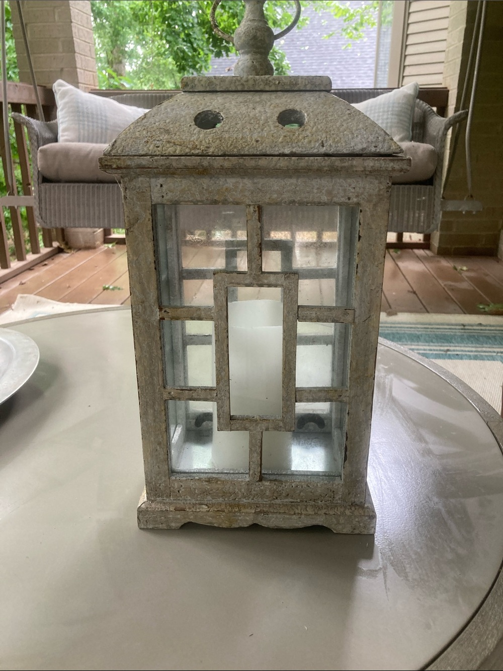 Wood and glass paned porch lantern with battery operated wax candle